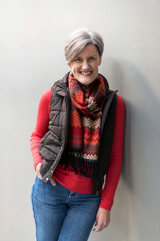 Image of Lee Carter leaning against wall