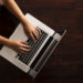 Overhead image of young woman with laptop