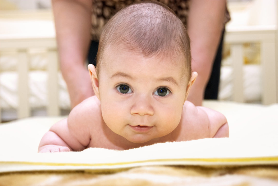 Image of baby having massage