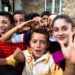 Group of happy Kurdish village kids